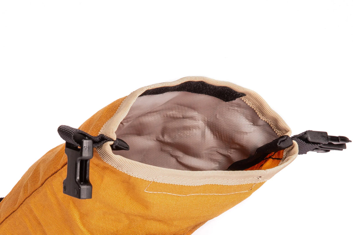 Outer Shell Rolltop Saddlebag, close-up of the roll-top opening