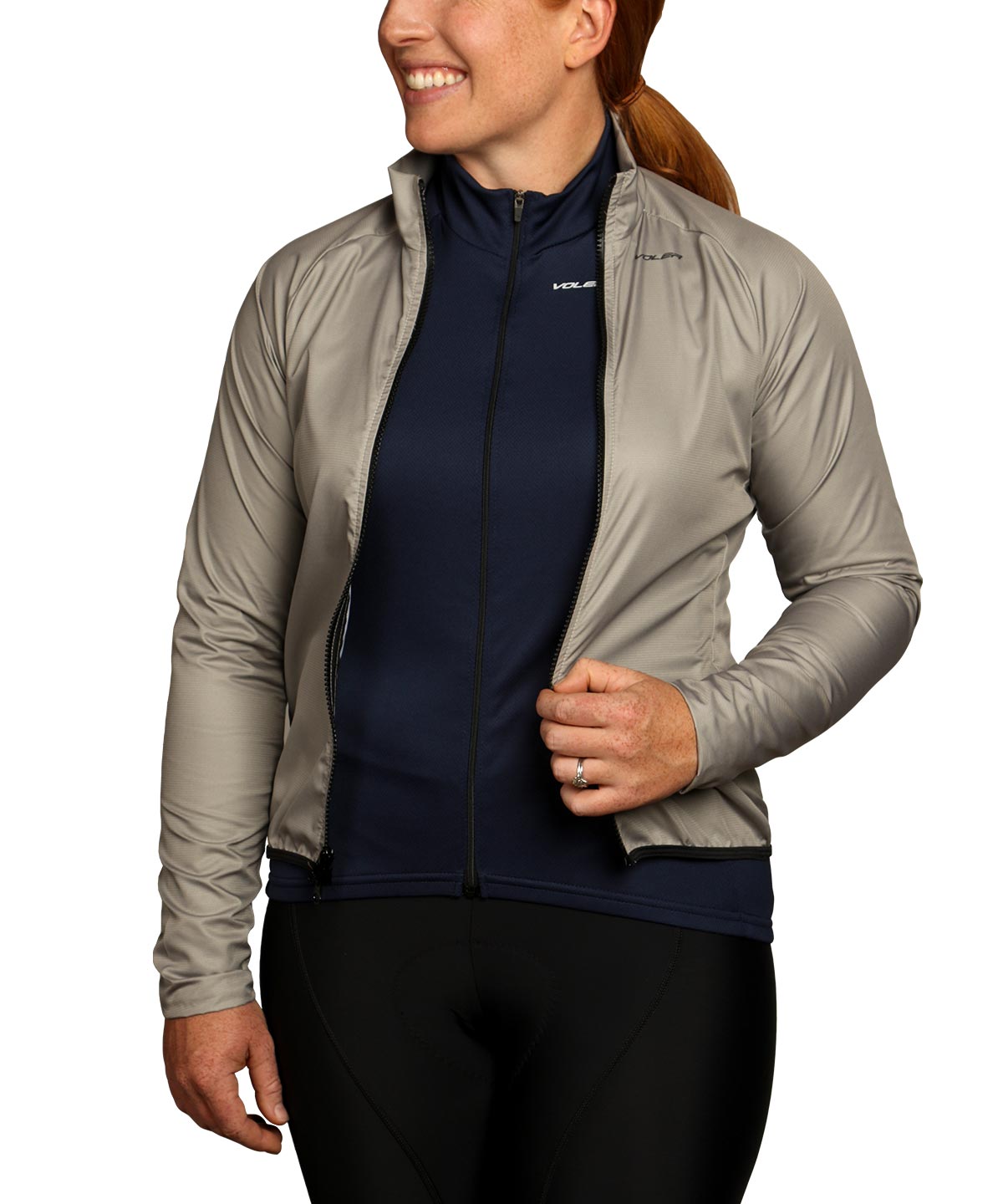 Voler Women's Jet Lightweight Long Sleeve Jersey, navy, worn under an open wind jacket