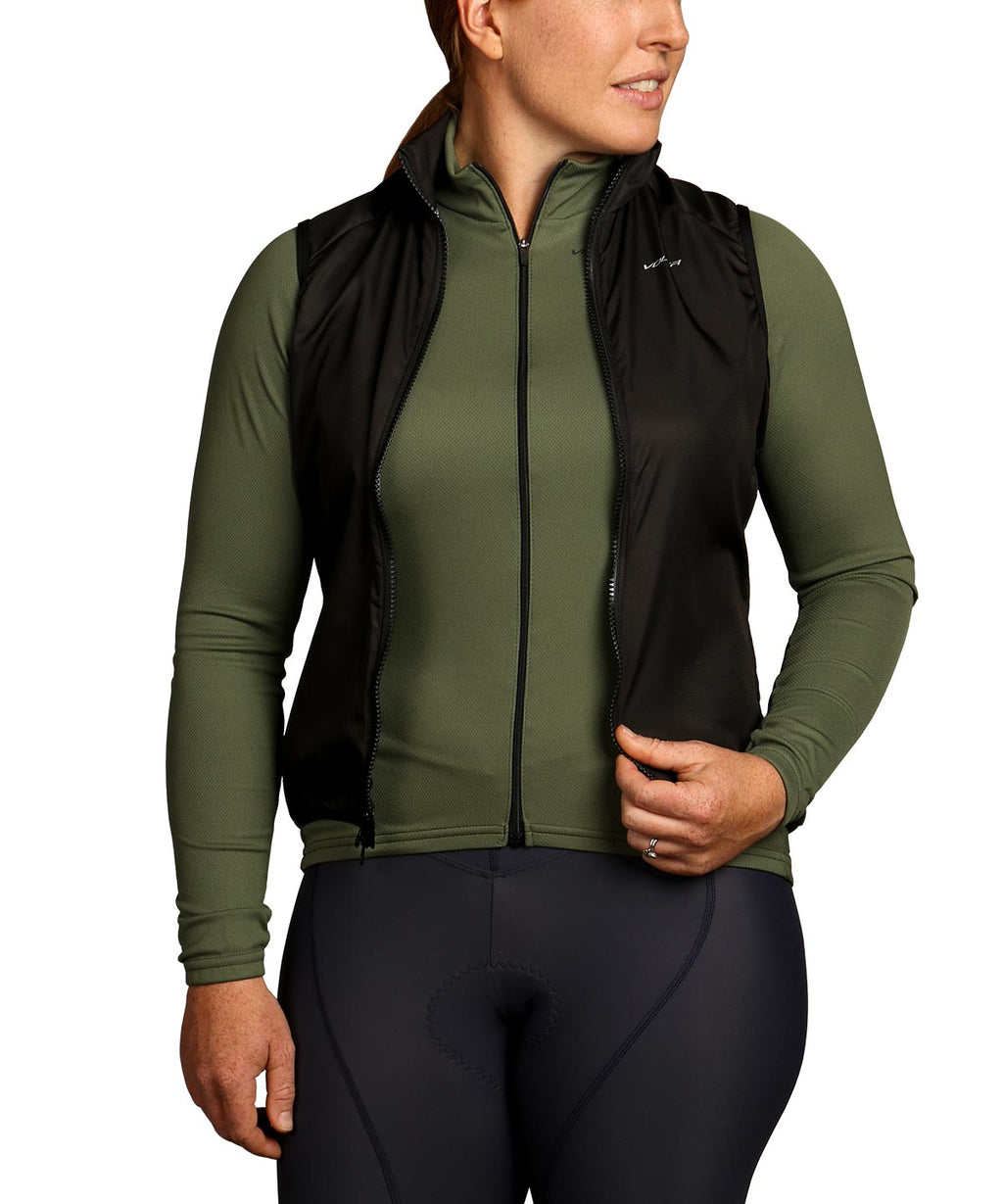 Voler Women's Jet Lightweight Long Sleeve Jersey, olive green, worn under an open black vest