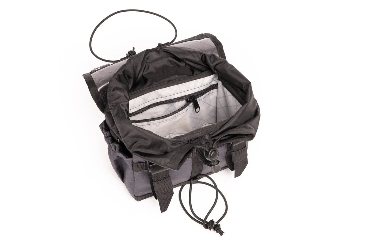Outer Shell Drawcord Handlebar Bag, open, top view of the interior