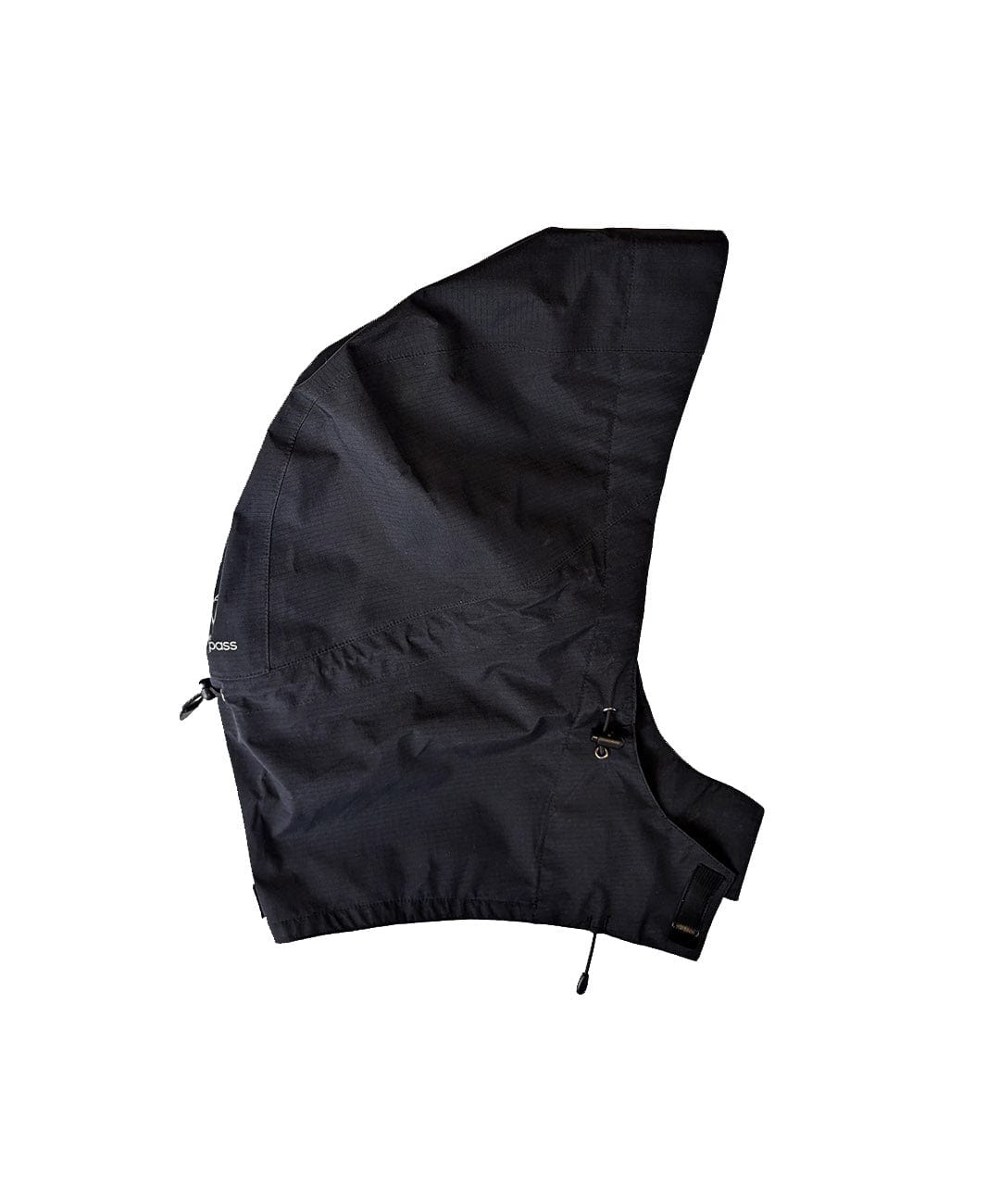 Showers Pass Gen III waterproof rain hood in black, shown on its own from the side with drawcord toggles at the front and back.