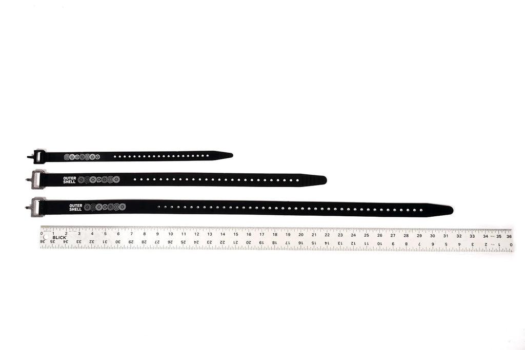 Outer Shell Logo Voilé Strap, three lengths next to a ruler