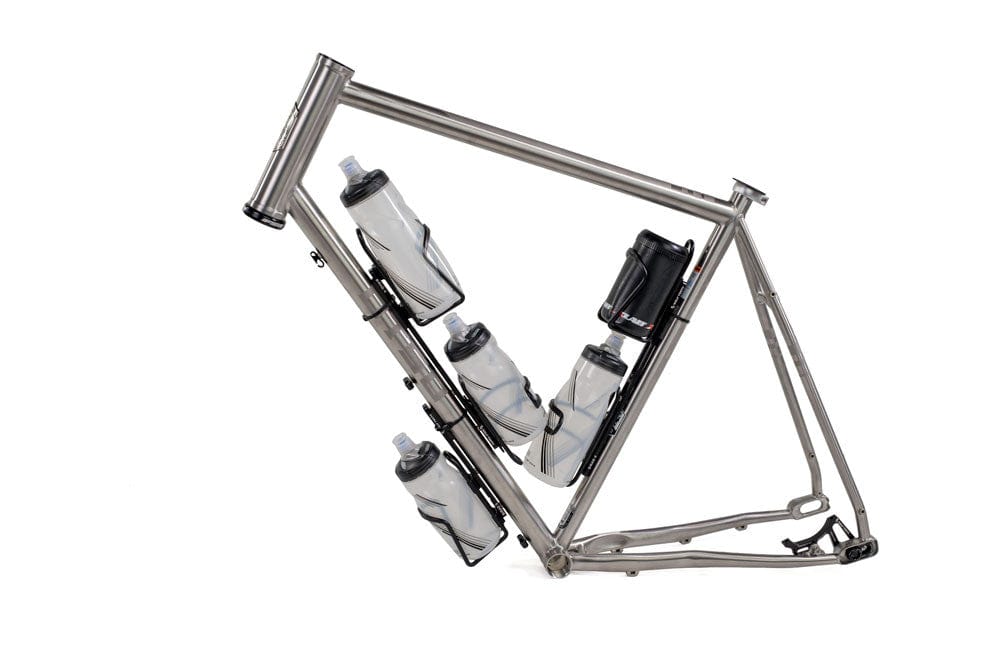 Wolf Tooth B-RAD Mounting Base, titanium frame with two bottles and a tool roll mounted