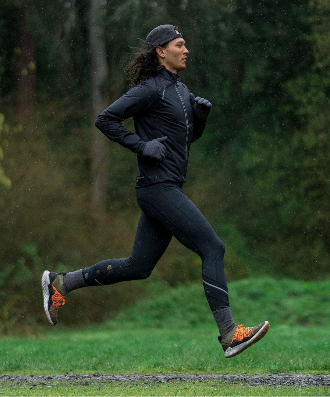 Men's Cloudburst Jacket, black, worn while running