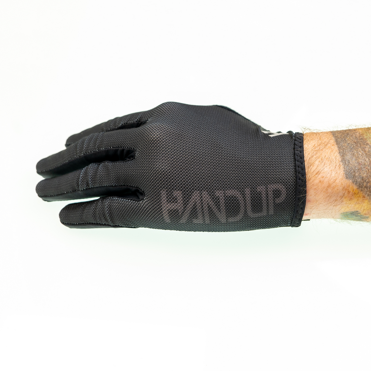Handup SunDura Gloves, Pure Black, worn on a hand, side view