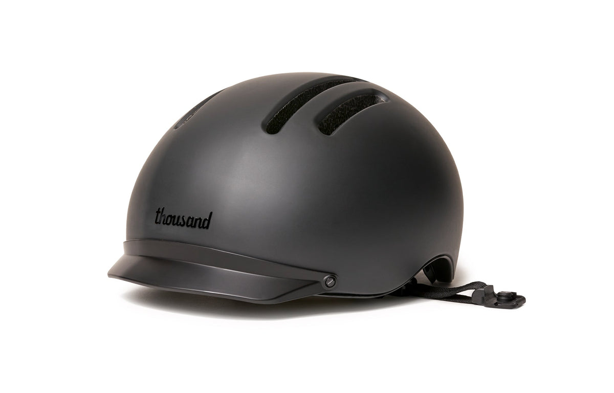 Thousand Chapter MIPS helmet in Racer Black with visor, side view