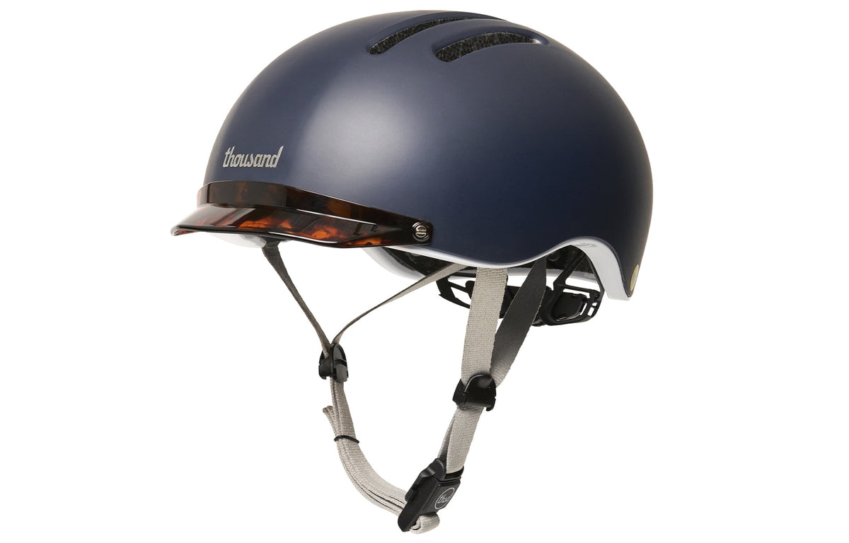 Chapter MIPS Helmet, navy with tortoise shell visor, side view with straps