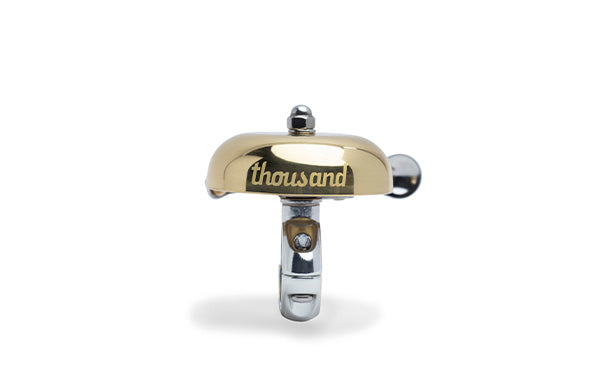 Pennant Bicycle Bell, brass, front view with logo