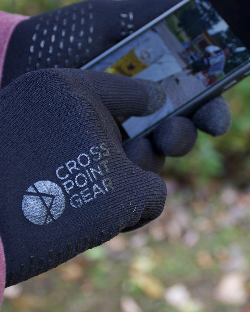Cross Point Waterproof Knit Gloves: Sport, navy, using a phone touchscreen