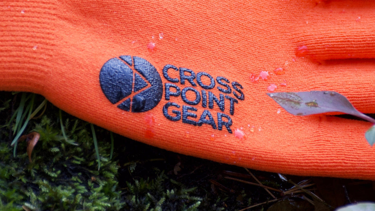 Cross Point Waterproof Knit Gloves: Sport, orange, close-up of the logo