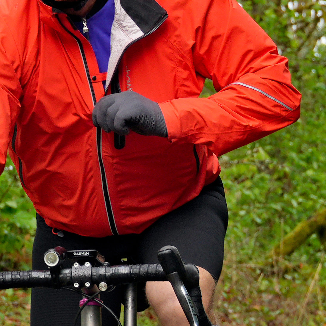 Men's Century Jacket, orange, rider zipping the front