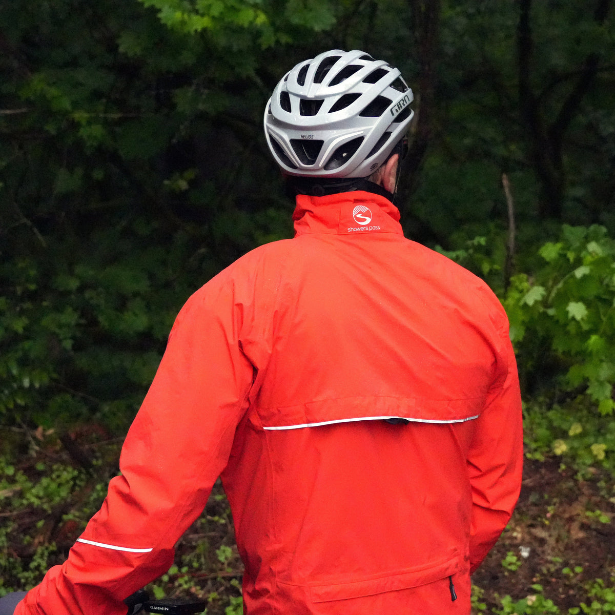 Men's Century Jacket, orange, worn by a rider, seen from behind