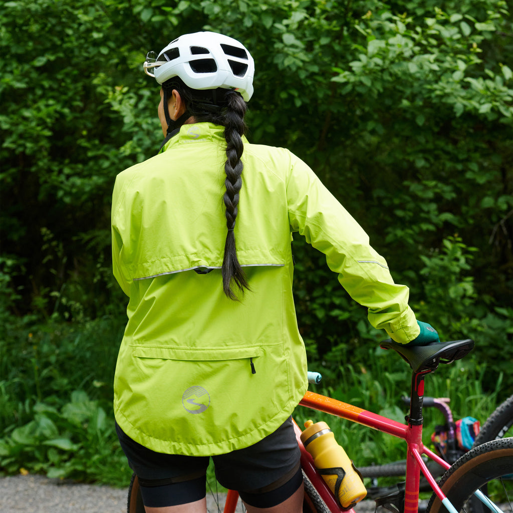 Women's Century Jacket, hi-vis yellow, worn by a rider, seen from behind
