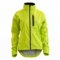 Women's Showers Pass Century jacket in hi-vis Leaf Green, black collar and centre zip, vertical chest zip pocket, and a grey drop-tail hem.