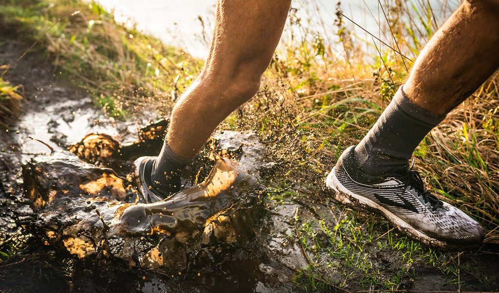 Cross Point Waterproof Socks: Sport, worn while running through mud