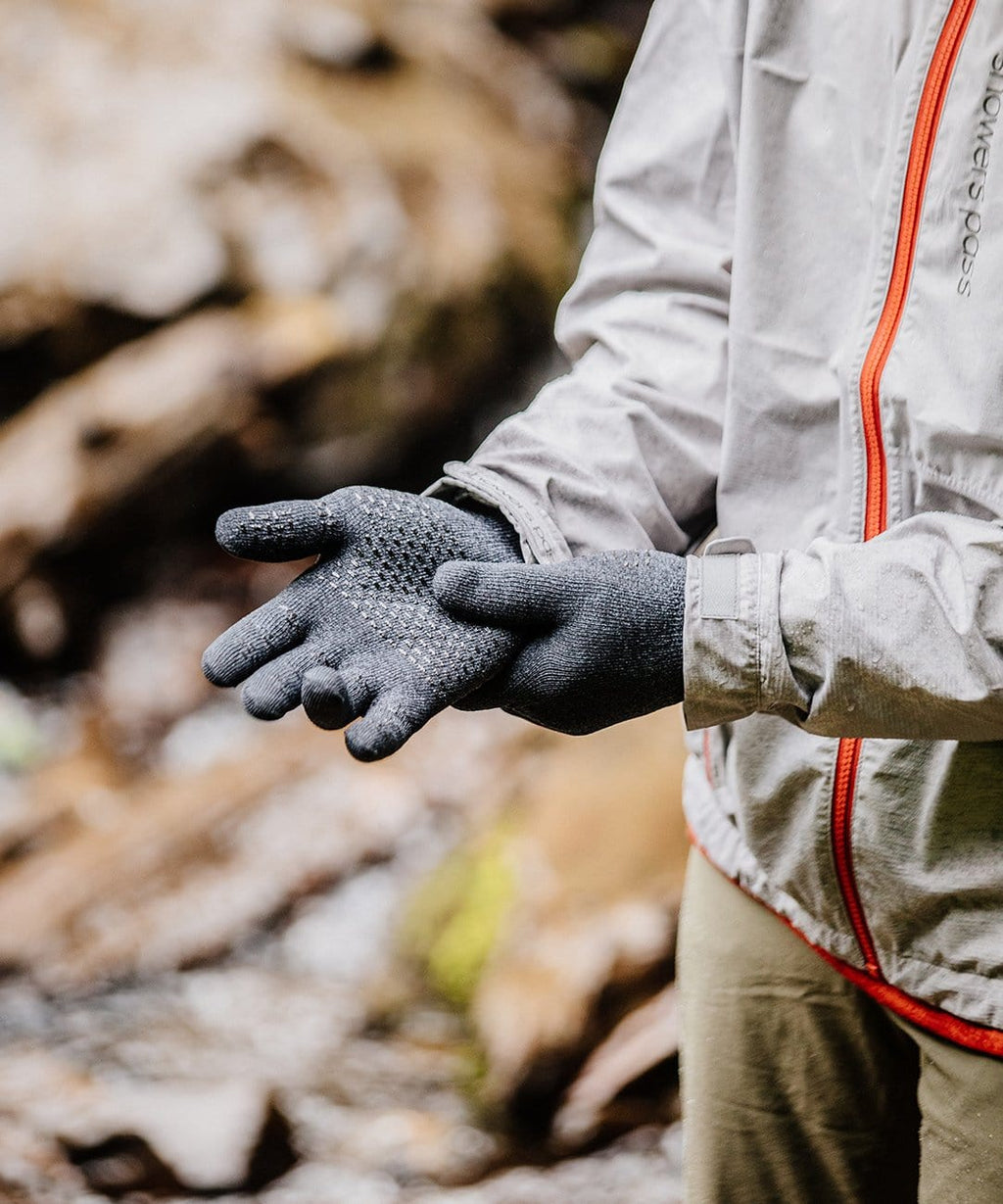 Cross Point Waterproof Knit Gloves: Pro Wool, gray, worn with a rain jacket