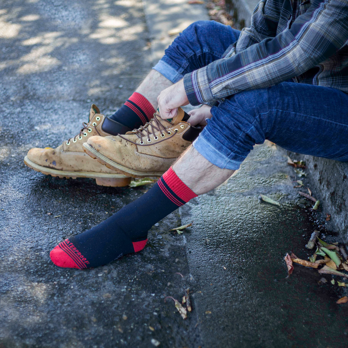 Cross Point Waterproof Socks: Classic FX, worn with shoes off, sitting by the water