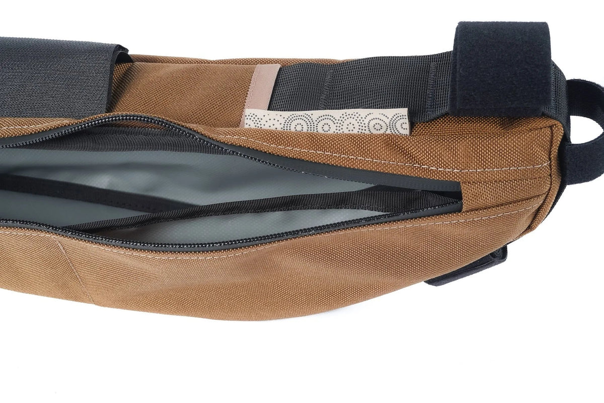 Outer Shell Half Frame Bag, close-up of the open zipper and lining