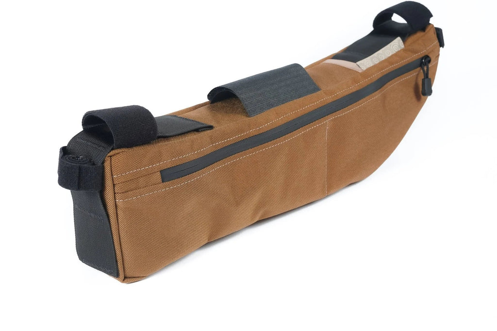Outer Shell Half Frame Bag, tan, angled view with straps