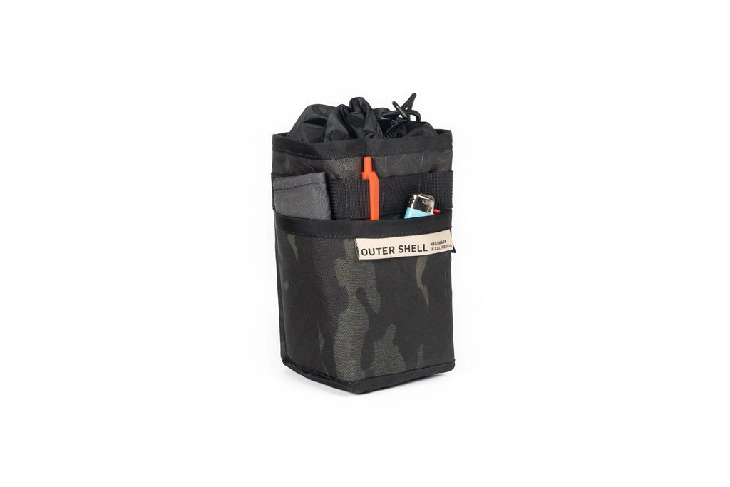 Outer Shell Stem Caddy, camo, with a tool in the side pocket