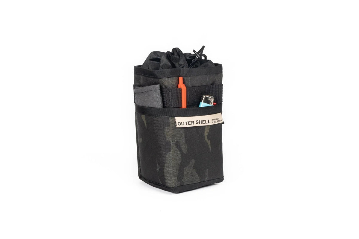 Outer Shell Stem Caddy, camo, with a tool in the side pocket