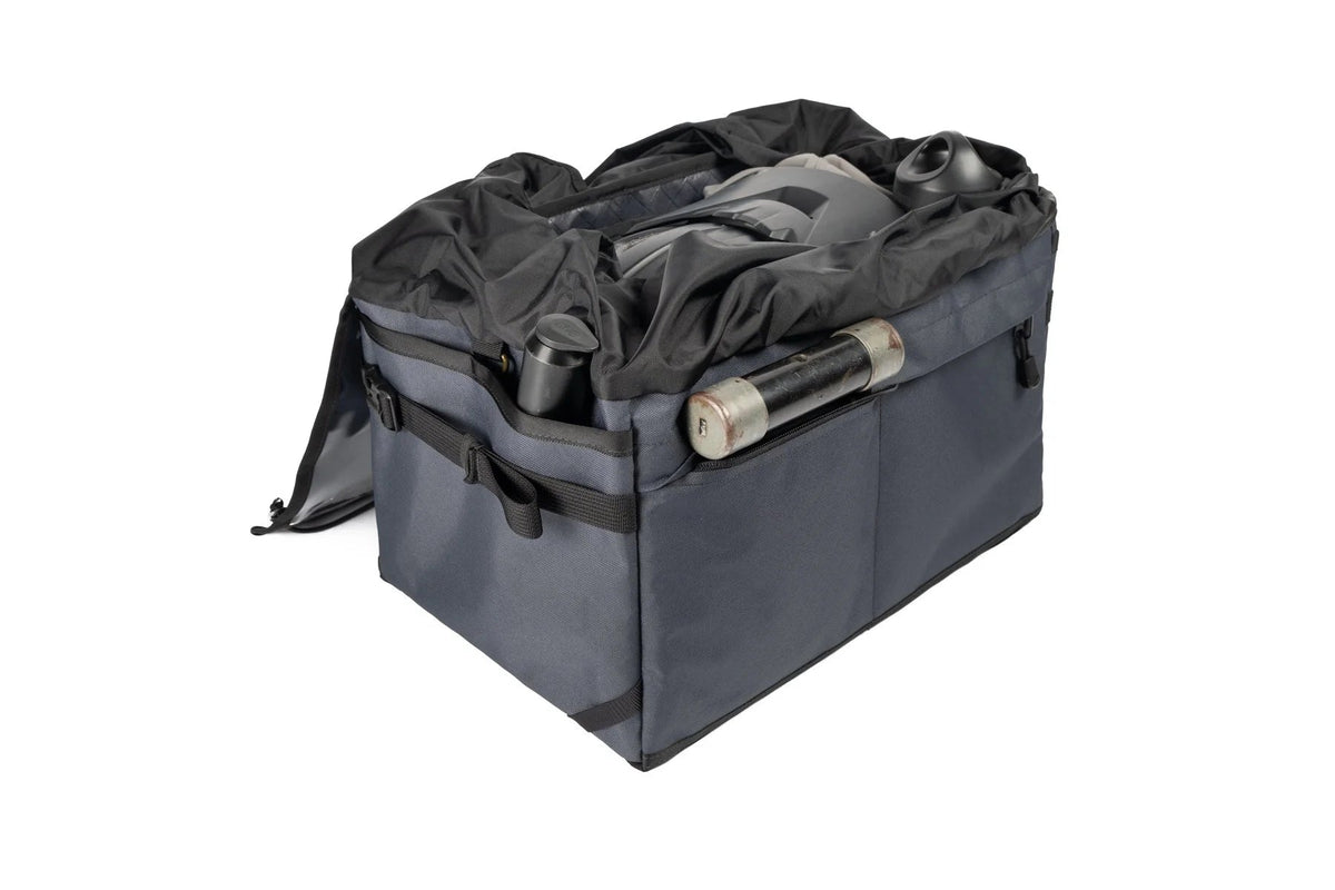 Outer Shell Rack Bag, open with a lock and gear inside