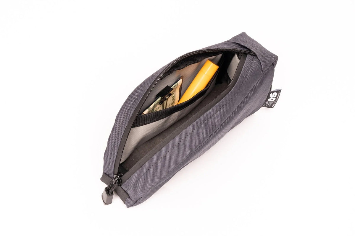 Outer Shell Top Tube Bag, open with items inside
