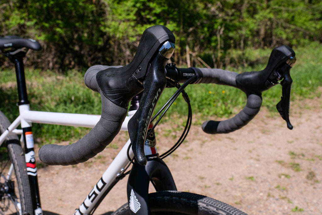 Wolf Tooth Supple Bar Tape, black tape on a drop bar bike