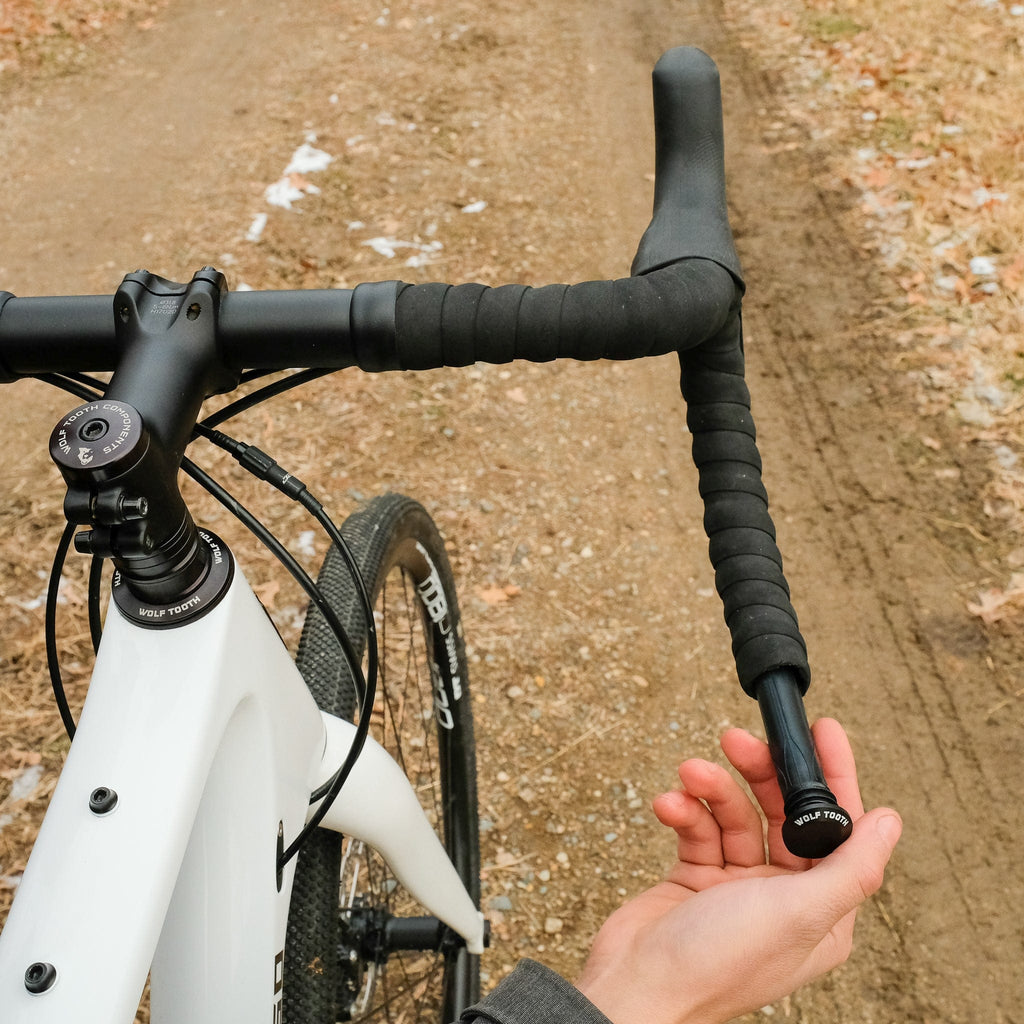 Wolf Tooth EnCase System Bar Kit One, tool being removed from a drop handlebar