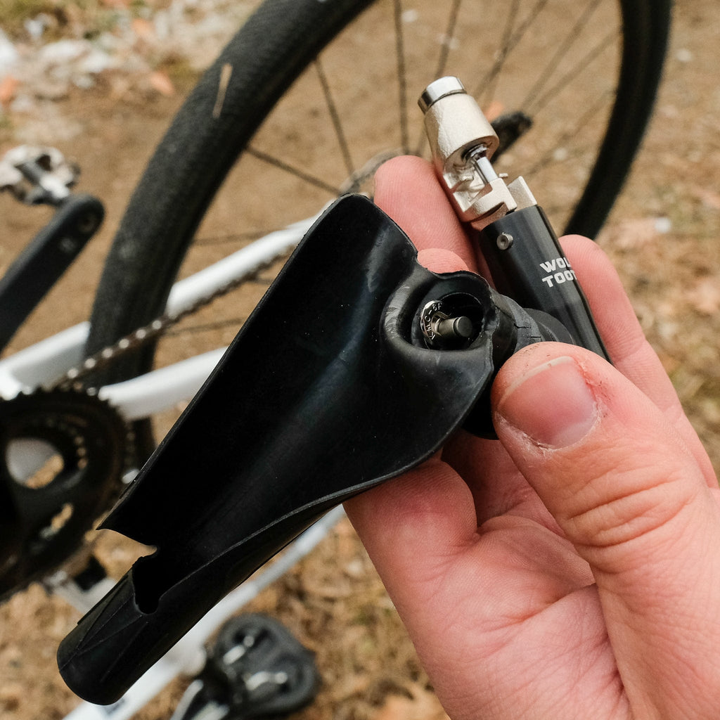 Wolf Tooth EnCase System Bar Kit One, using the tool at the rear wheel