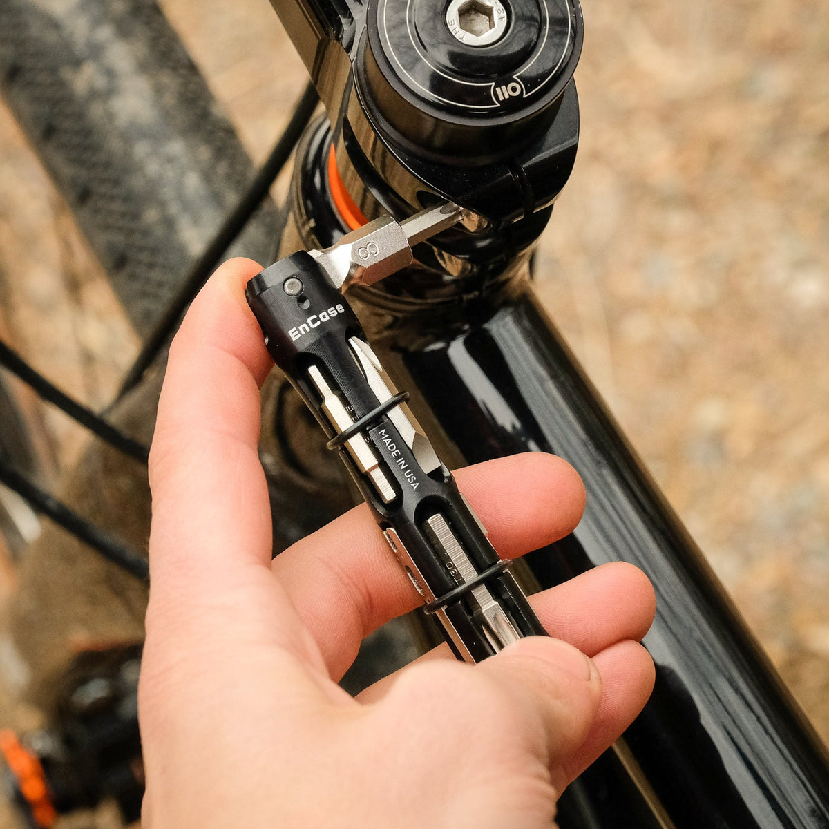 Wolf Tooth EnCase Hex Bit Wrench Multi-Tool, adjusting a fork