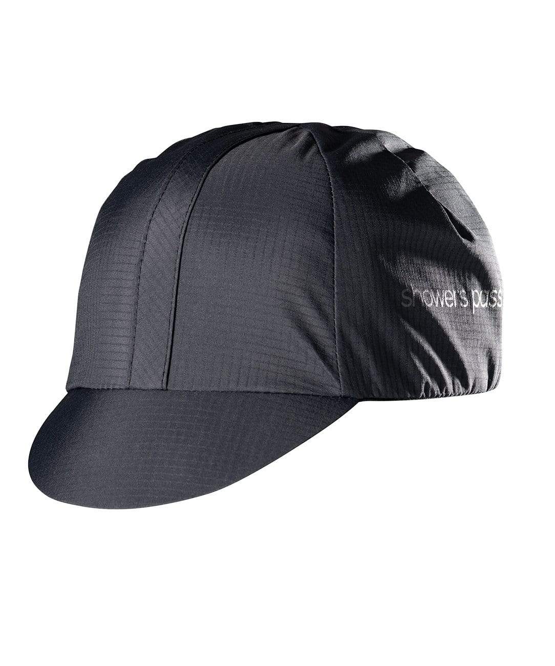 Black Showers Pass Elite cycling cap, three-quarter front view with the short brim turned down and the wordmark on the side panel.