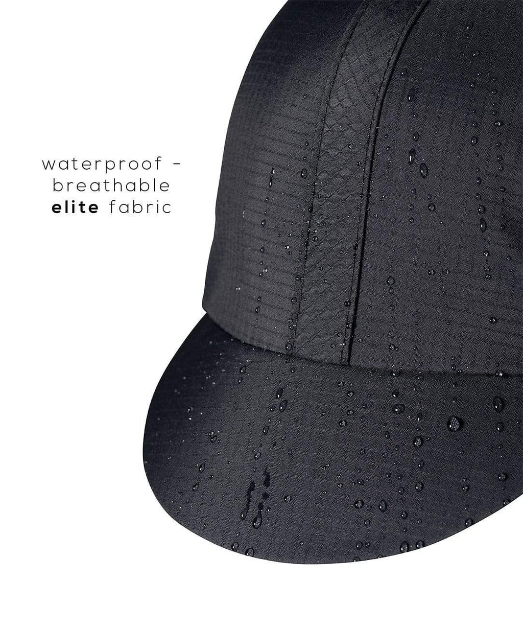 Elite Cycling Cap, close-up of the waterproof fabric with water droplets