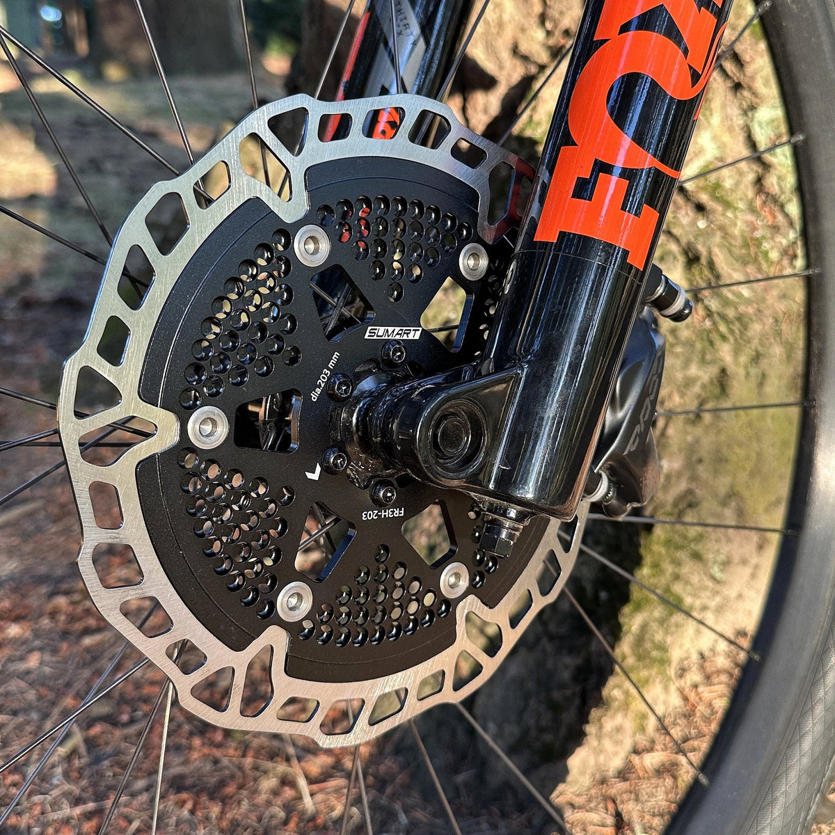 Sumart FR3H Floating Disc Brake Rotor, on a front wheel next to the fork