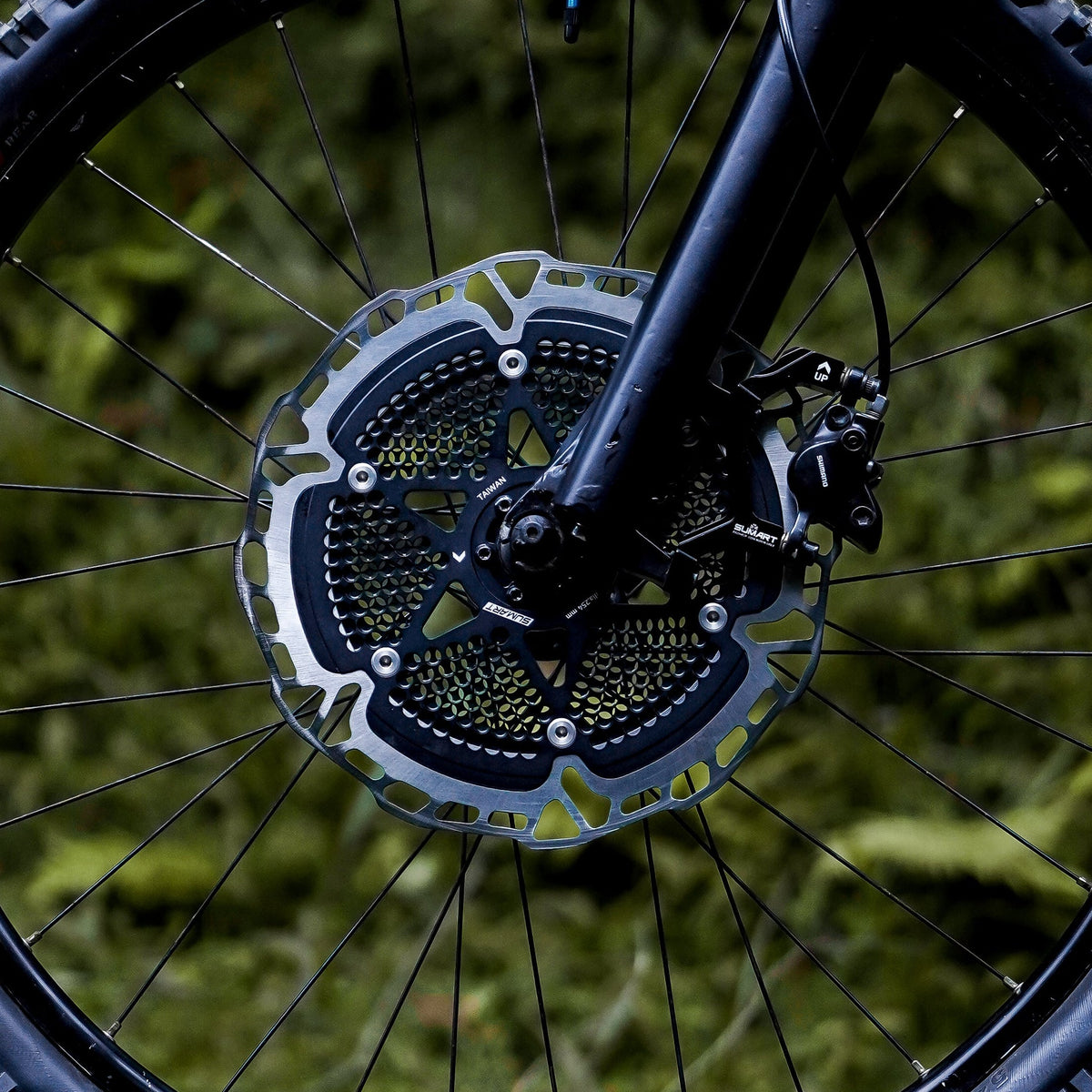 Sumart FR3H Floating Disc Brake Rotor, on a front wheel, outdoors