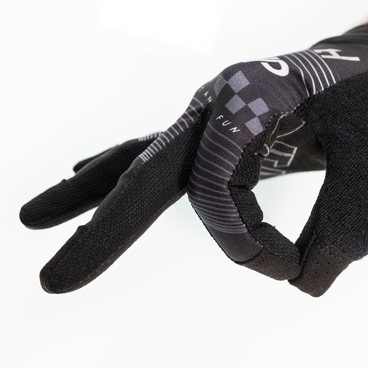 Handup Pro-Formance Gloves, Black/Grey, worn on a hand, side close-up