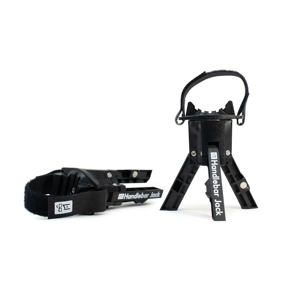 Handlebar Jack V3 handlebar stands, a pair of black tripod stands with hook-and-loop straps