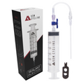 KOM tubeless sealant injector, syringe with hose and valve core tool, beside its box