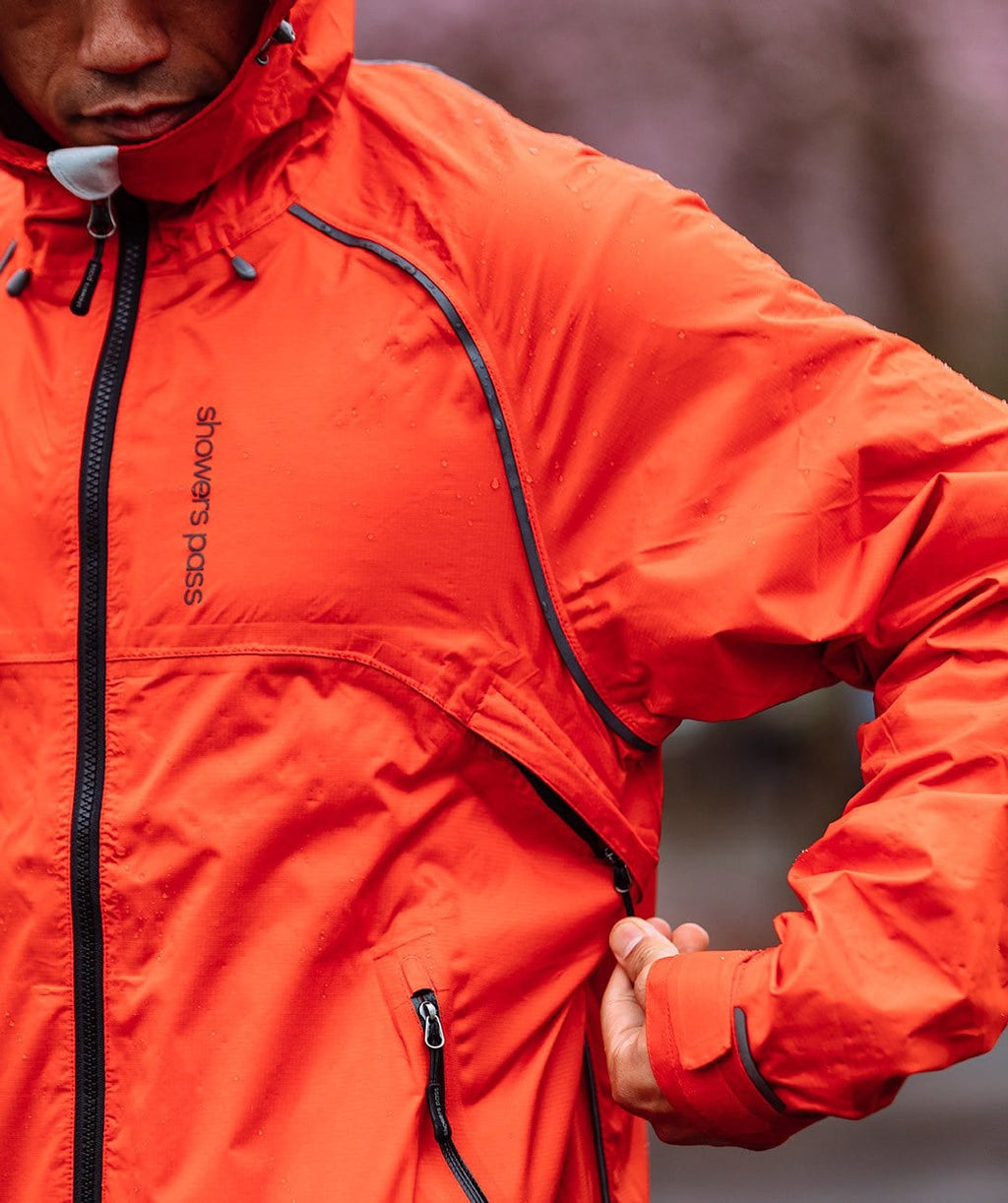 Men's Syncline CC Jacket, orange, close-up of the side vent zipper