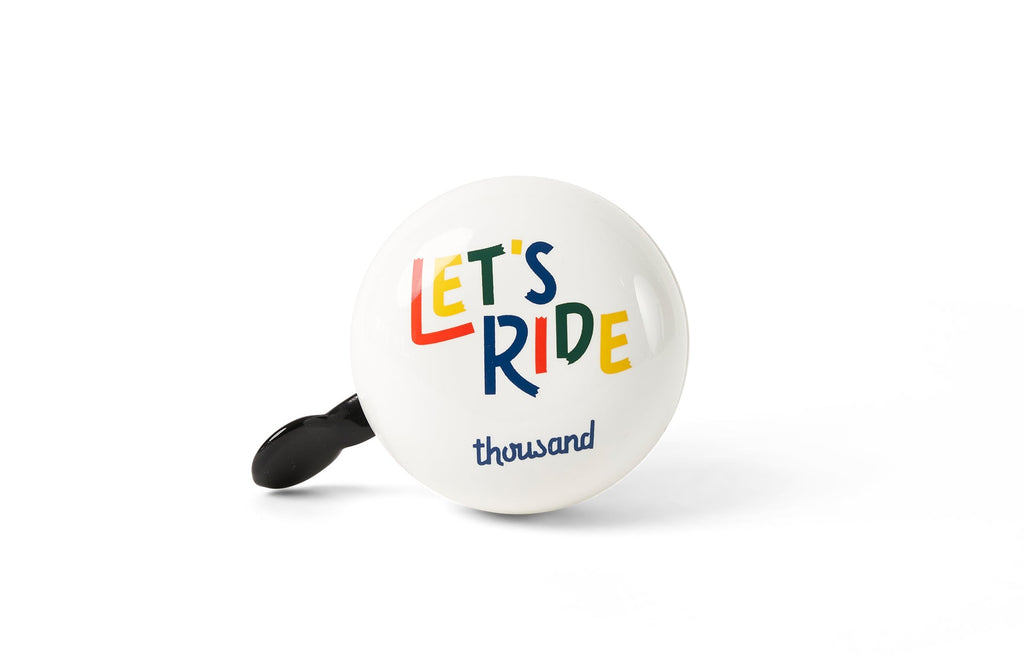 Thousand Jr. Bicycle Bell, white with "Let's Ride" print