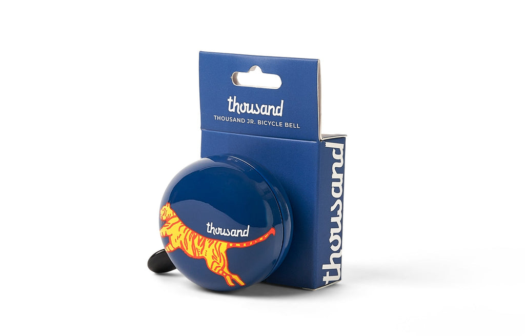 Thousand Jr. Bicycle Bell, navy with tiger print, in packaging