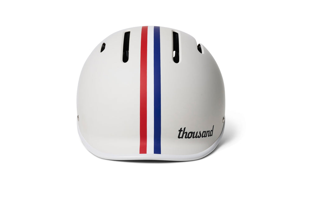 Thousand Jr. Kids Helmet, white with red and blue stripes, rear angle