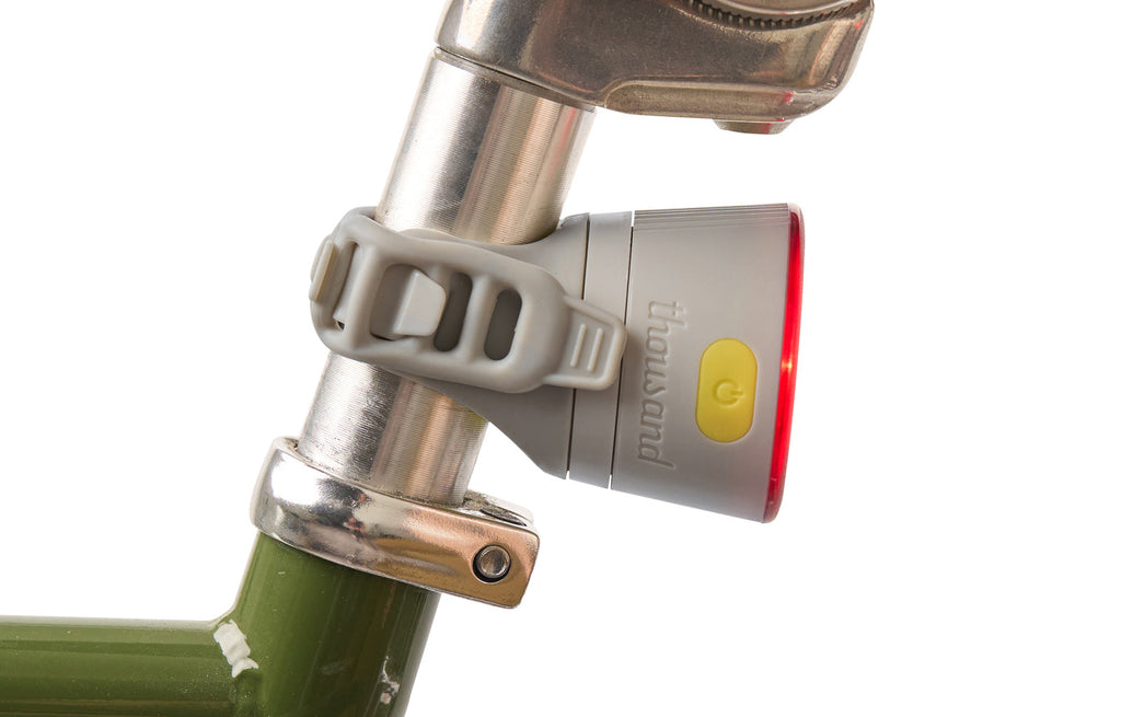 Traveler 2.0 Magnetic Bike Lights, gray rear light mounted on a seatpost