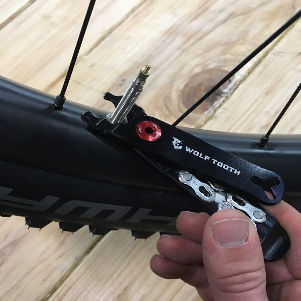 Wolf Tooth Pack Pliers, tightening a valve lock nut at the wheel