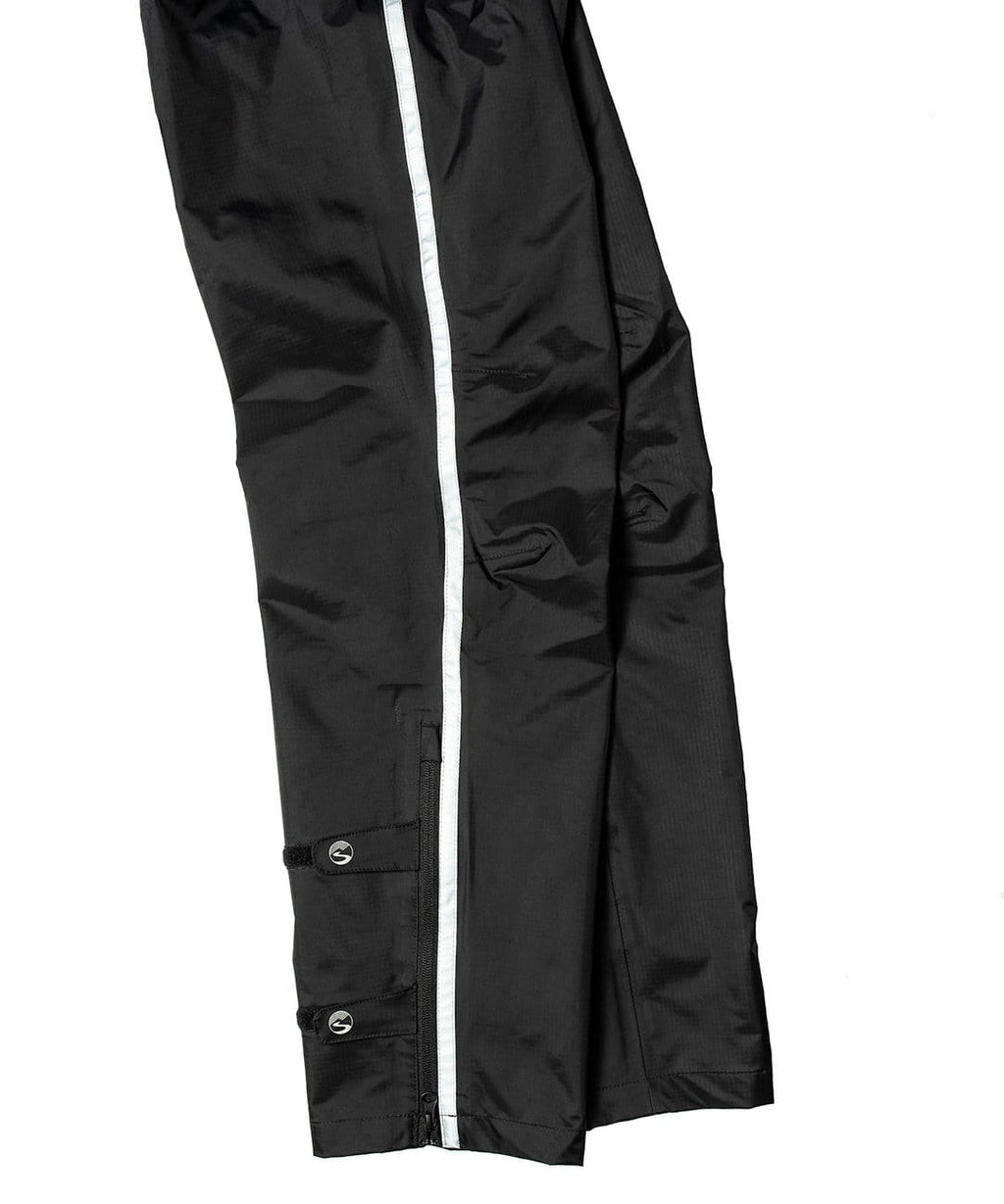 Women's Transit Pant, close-up of the lower leg with reflective stripe and ankle snaps