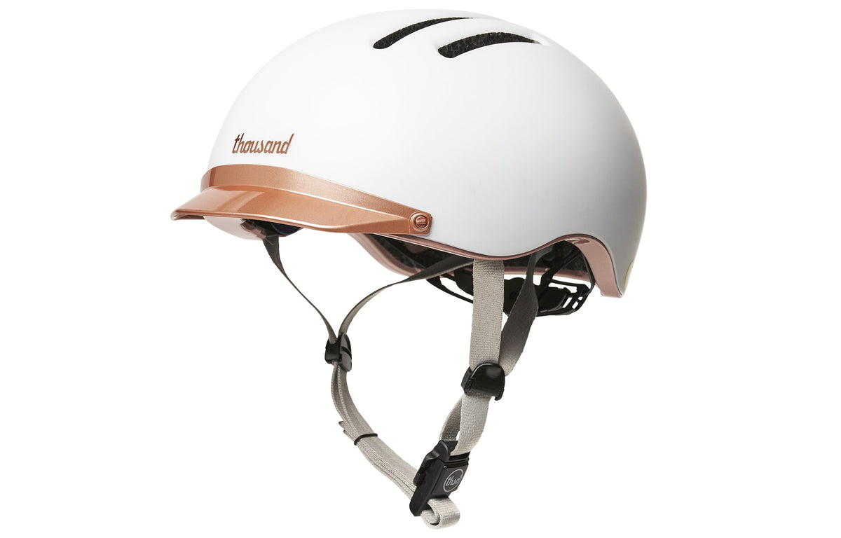 Chapter MIPS Helmet, white with rose gold visor, side view with straps