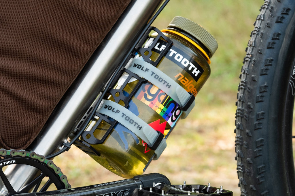 Wolf Tooth Morse Cargo Cage, holding a bottle on a fork leg