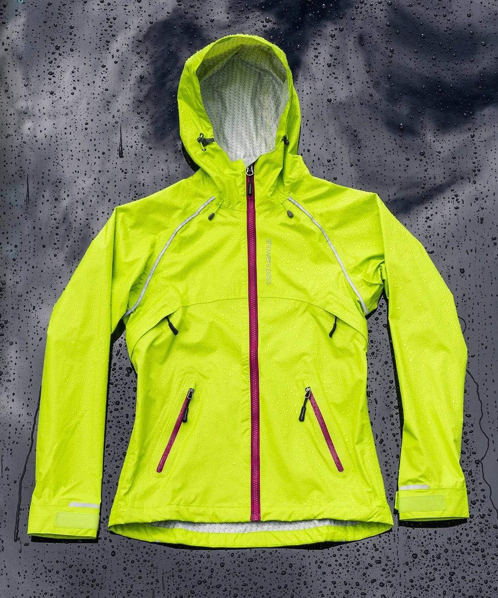 Women's Syncline CC Jacket, hi-vis yellow, front view with hood, wet background