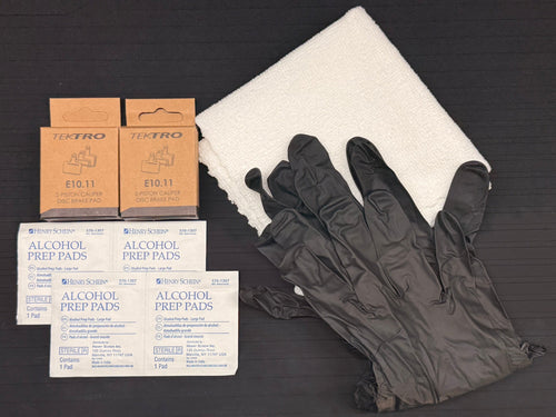 Aventon Brake Pad Refill Kit contents: two Tektro E10.11 pad sets, alcohol prep pads, cleaning cloth and nitrile gloves