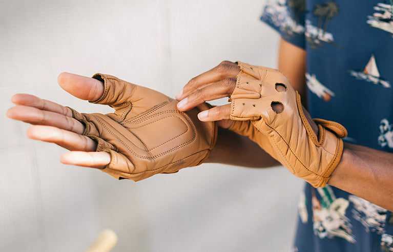 Leather Bike Gloves, tan leather pair being pulled on